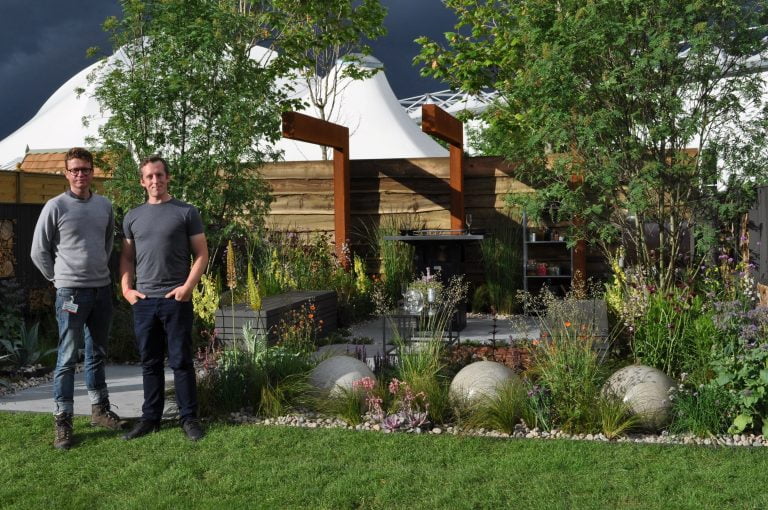 Luxury garden with custom-built outdoor seating and decking