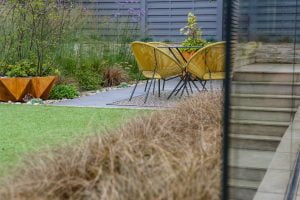 Contemporary garden layout with seating area