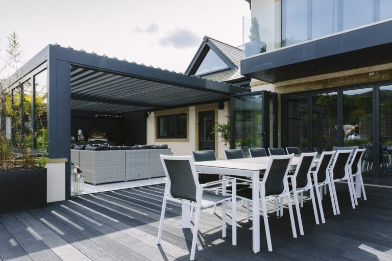 modern large garden outdoor kitchen and seating space