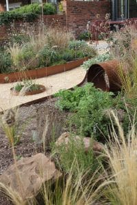 yellow garden path and rockery